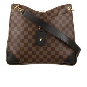 Louis Vuitton prestige shoulder bag and zippy wallet with extra strap.